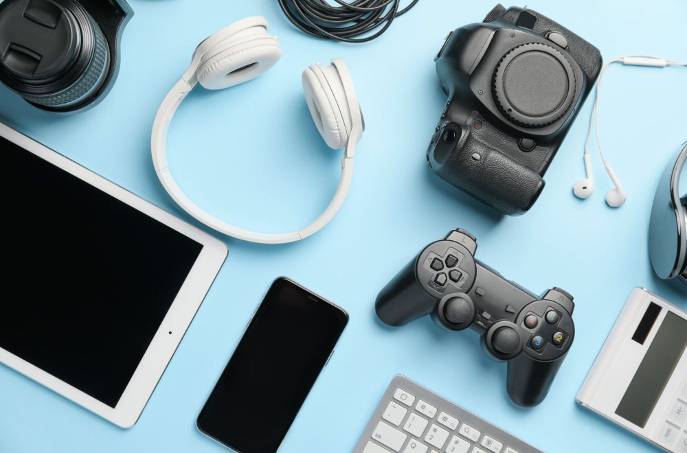 Different modern devices on color background Different modern devices on color background